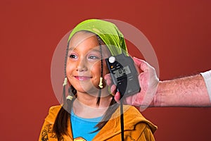 Girl and flash meter