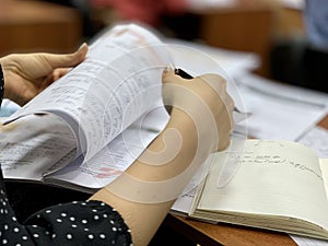 Girl flattens a book