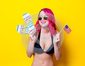 Girl with flip flops and american flag