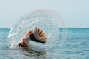 Girl Flipping Hair in Water