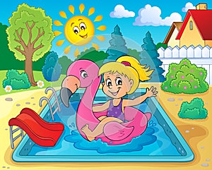 Girl floating on inflatable flamingo 2