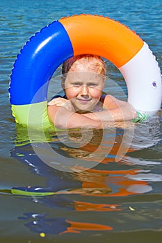 Girl floating in the river