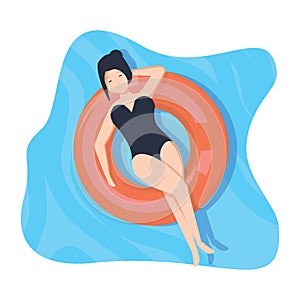 Girl floating on the water, sunbath on inflatable ring in the swimming pool or sea. Summer vacation relaxation resort