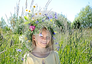 Girl with flower diadem photo