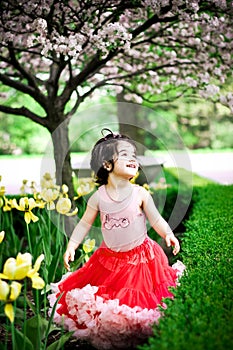 Girl in flower garden