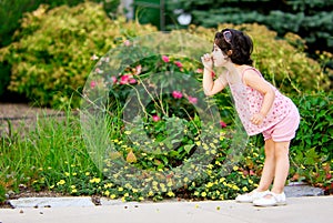 Girl in flower garden
