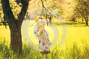 Girl with flower in hand