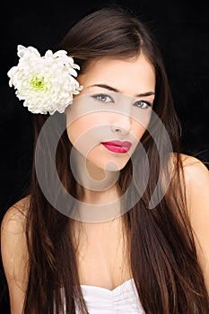 Girl with flower in her hair