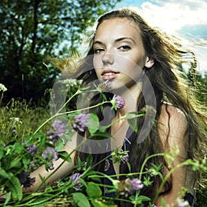 Girl in flower meadow