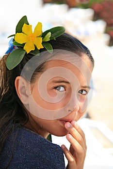 Girl with flower near pool