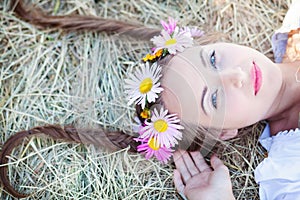 Girl with flower wreath