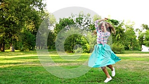 Girl with flowers whirling