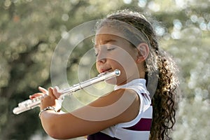 Girl with a flute photo