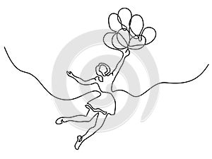 Girl flying in air with balloons