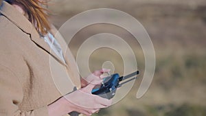 girl flying a drone alone