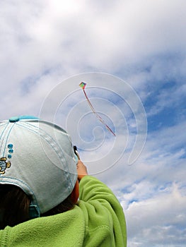 Girl flying a kite