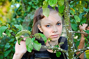 The girl among foliage