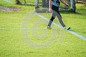 Girl is in the football field