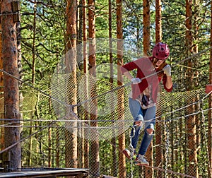 Girl in a Forest Rope Park Challenge