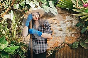 Girl with a fork working on a farm