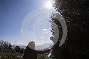 Girl freeing herself from the protective mask after overcoming illness, virus, covid-19. coronavirus