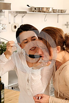 Girl-friends cooking together