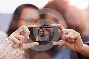 Girl, friends and phone screen for selfie as university student on campus for education, fun and memories. Women