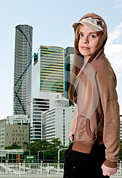 Girl in front of buildings in Brisbane.