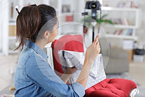 Girl in front camera during recording vlog