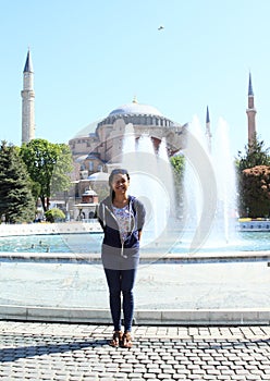 Girl in front of Hagia Sofia in Istanbul photo