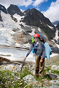 A girl in front of the mountains