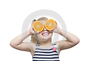 Girl with fruits oranges eyes, happy Caucasian kid portrait isolated on white. Child summer concept
