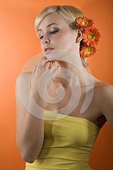 Girl with gerbera on head