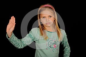 Girl gesturing stop with hand