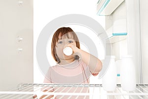 Girl getting milk