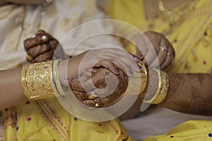 Girl getting ready for her marraige by her mother