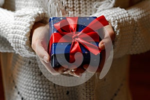 Girl with a gift in their hands