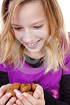 Girl with ginger nuts (pepernoten)