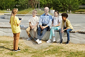 Girl Giving Presentation in Outdoor Lesson