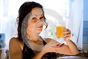 Girl with glass of fresh juice