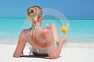 Girl with a glass of orange juice