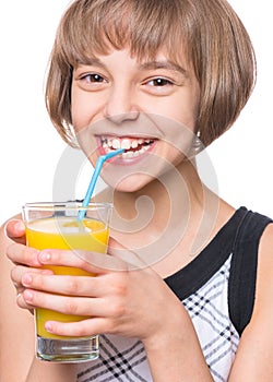 Girl with glass of orange juice