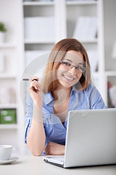 Girl with glasses at home