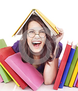 Girl in glasses with stack book .