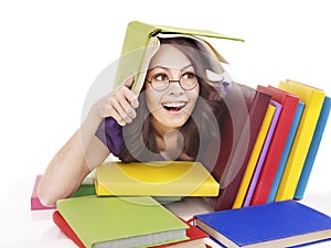 Girl in glasses with stack book .