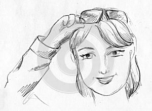 Girl with glasses up, pencil sketch photo