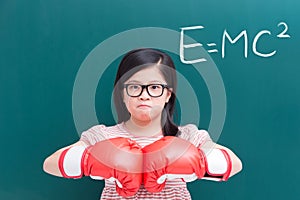 Girl with glove and e=mc2