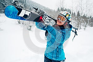 Girl go with ski equpment in ski touring