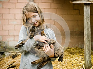 Girl with goatling