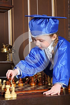 Girl goes black pawn during a game of chess